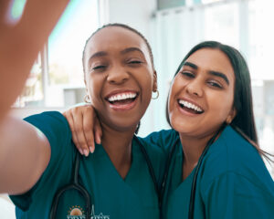 two happy dental techs