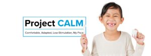 Project CALM: Comfortable, Adapted, Low-Stimulation, My-Pace. A smiling child holds a toothbrush and a model tooth.